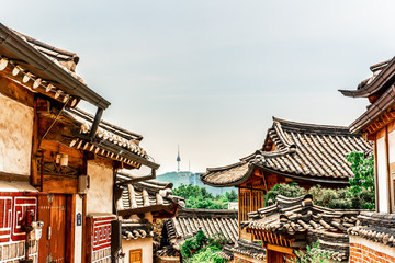 Fototapeta na wymiar local travel with traditional house and clothing in korea from beautiful classic vintage of roof and building travel landmark name is bukchon hannok