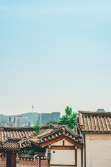 local travel with traditional house and clothing in korea from beautiful classic vintage of roof and building travel landmark in korea with copy space background