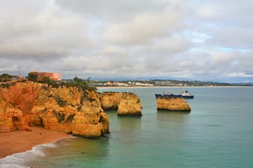 Cloudy cliff rocks of Algarve region, Portugal