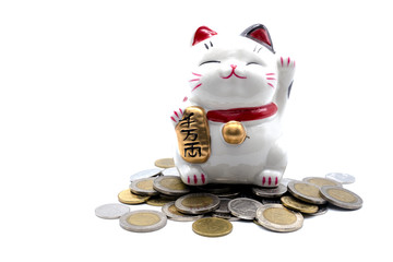 ceramic lucky cat statue for Japanese isolated on a white background, Holds a gold medal in Japanese that translates into prosperity and good fortune.