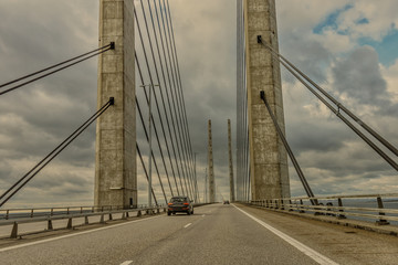 Car driving over the bridge between Sweden and Denmark