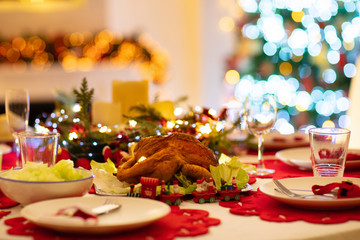 Christmas dinner at fire place and Xmas tree.