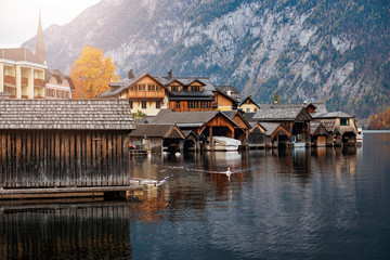 Hallstatt village on Hallstatter lake in Austrian Alps / Evening light during autumn