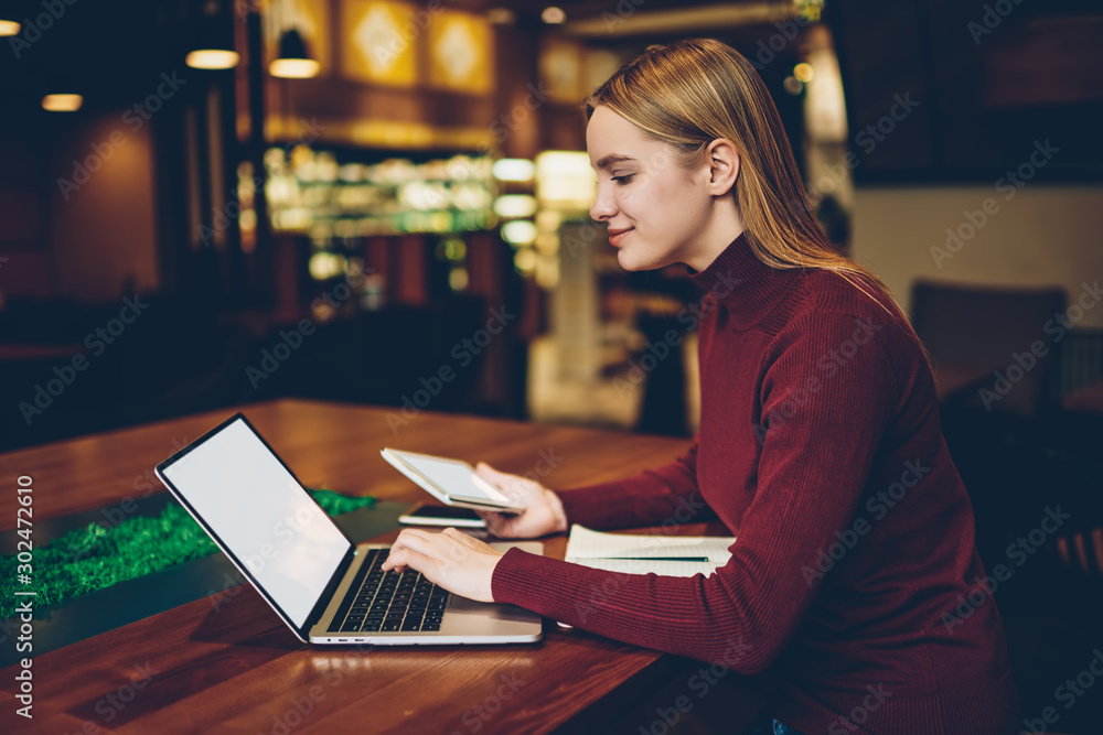 Poster happy caucasian female freelancer feeling good of working remotely using laptop computer with blank 