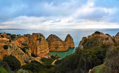 Rocky beach in Lagos - Portugal on a cloudy day 31.Oct.2019