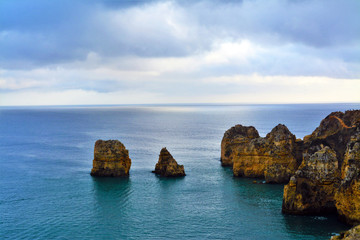 Rocky beach in Lagos - Portugal on a cloudy day 31.Oct.2019