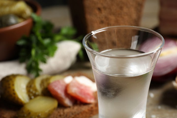 Cold Russian vodka on table, closeup. Space for text