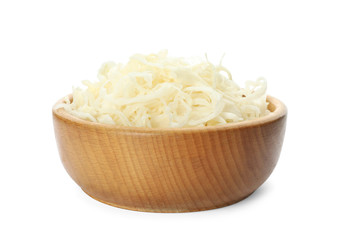 Wooden bowl of tasty fermented cabbage isolated on white