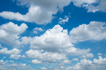 Naklejka na ściany i meble The blue sky with clouds.