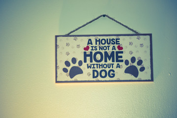 A house is not a home without a dog - wooden board