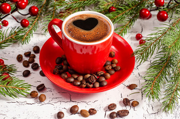 Red cup coffee with christmas tree on wood table. Christmas concept. Merry Christmas. Good morning coffee.