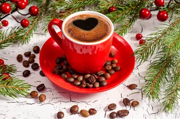 Fotobehang Koffie Red cup coffee with christmas tree on wood table. Christmas concept. Merry Christmas. Good morning coffee.