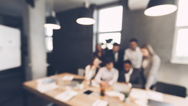 Business Team In Meeting Room, Blur Background