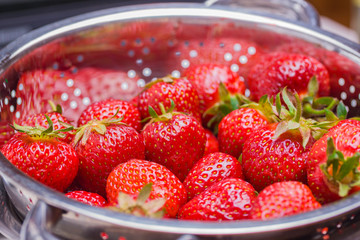 Fresh strawberries in colander healthy