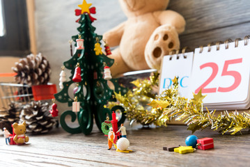 Fototapeta na wymiar miniature people prepare Christmas party, christmas decoration concept