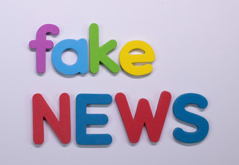  "Fake News" written with color sponge