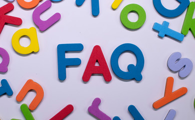 Word "FAQ" written with color sponge