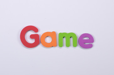 Word Game written with color sponge