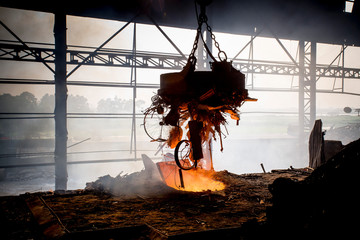 Scrap steel melts down in an induction furnace at Demra, Dhaka, Bangladesh.