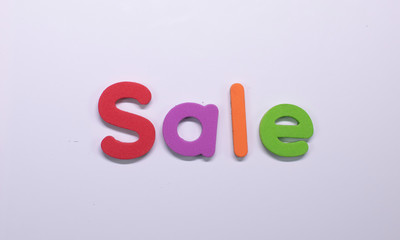 Word Sale written with color sponge