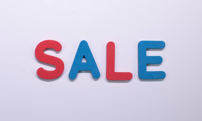 Word Sale written with color sponge