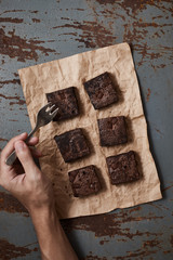 A piece of homemade chocolate brownies, sweet and dessert..