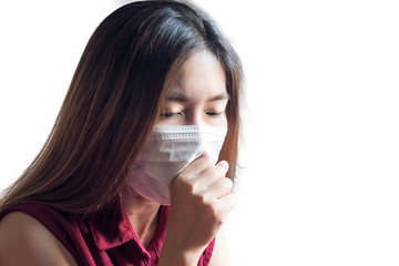 Young Asian Chinese Thai woman wearing respiratory mask to protect the dust and the smoke in the pollution air,healthcare concept