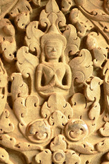 Inside Angkor Wat Ankor Thom, Siem Reap, Cambodia.Front portrait  sculpture low relief seem like a Persevere in beautiful details Thai  Thai Kanok pattern.Sandstone with a little cracks on its nose.