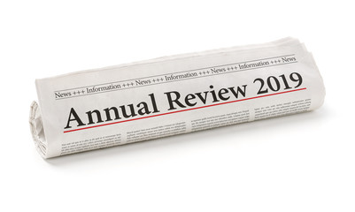 Rolled newspaper with the headline Annual review 2019