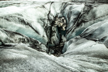 Detailed view of a crack in the ice on Solheimajojull glacier
