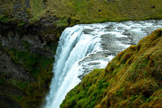 View of Skogafoss from top of the falls in the summer