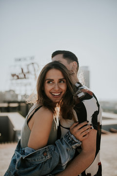 Young couple on rooftop in the city