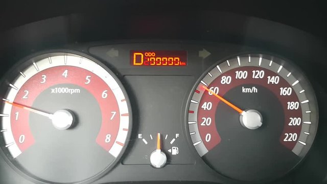 The beautiful number on the odometer of the car 199999 kilometers is replaced by 200,000. Active operation of the car in everyday life. Work on the car