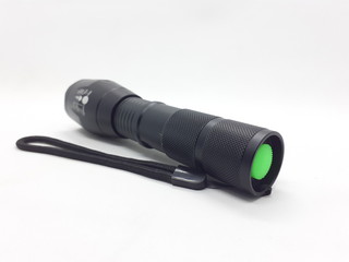 Super Bright Stainless Steel Black Metallic Tactical Flash Light for Security Police SWAT Equipment in White Isolated Background