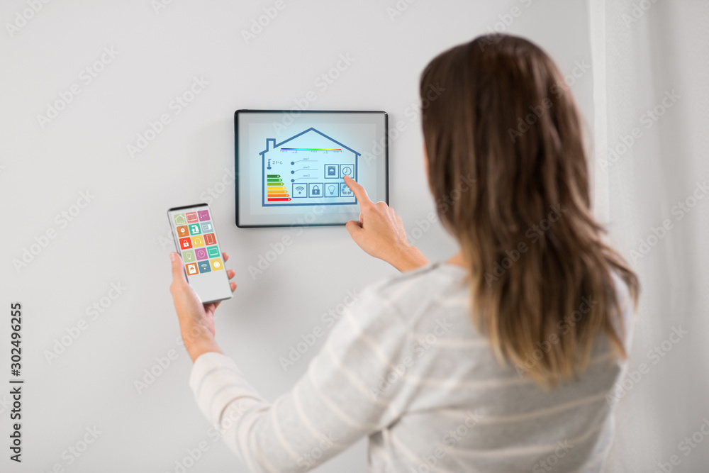 Poster automation, internet of things and technology concept - woman using tablet pc computer and smartphon