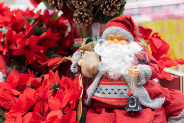 Happy Santa Claus Doll on Christmas time. Christmas greeting card.