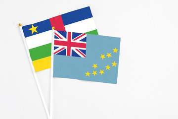 Tuvalu and Central African Republic stick flags on white background. High quality fabric, miniature...