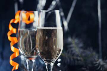 Glasses of champagne on a festive background . Christmas alcohol party