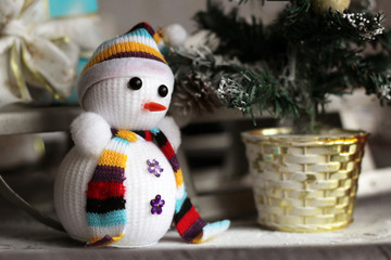 Christmas snowman toy close up with scarf