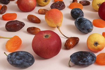 healthy fruits on a pink background