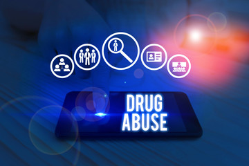 Writing note showing Drug Abuse. Business concept for the habitual taking of addictive or illegal...