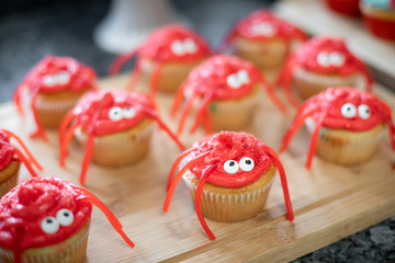 Close up on licorice crabs on seafood themed cupcakes
