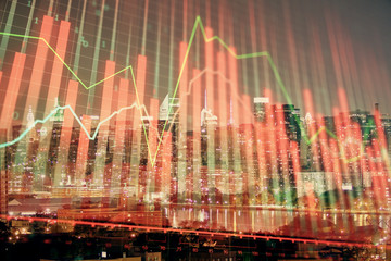 Double exposure of forex chart drawings over cityscape background. Concept of success.