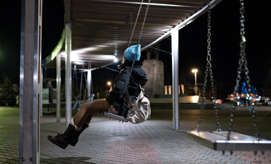 swinging in night