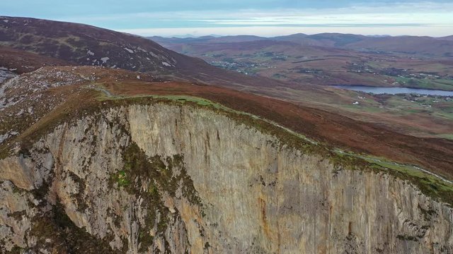Aerial of Slieve League Cliffs are among the highest sea cliffs in Europe rising 1972 feet or 601 meters above the Atlantic Ocean - County Donegal, Ireland