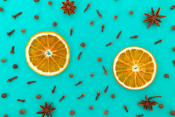 Christmas composition made with slices of dried oranges, anice stars, cloves. Top view, copy space.