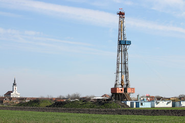 Fototapeta na wymiar Oil and gas drilling rig in oilfield industry