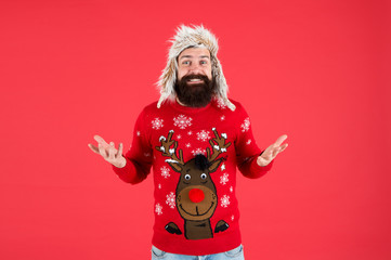 Invitation ugly sweaters party. Sweater with deer. Hipster bearded man wear winter sweater and hat....