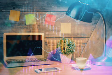 Multi exposure of graph and financial info and work space with computer background. Concept of...