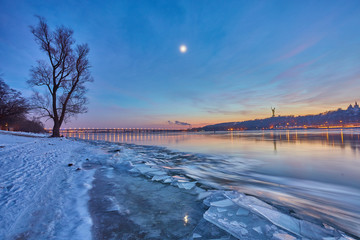 sunset over the river Dnieper on winter